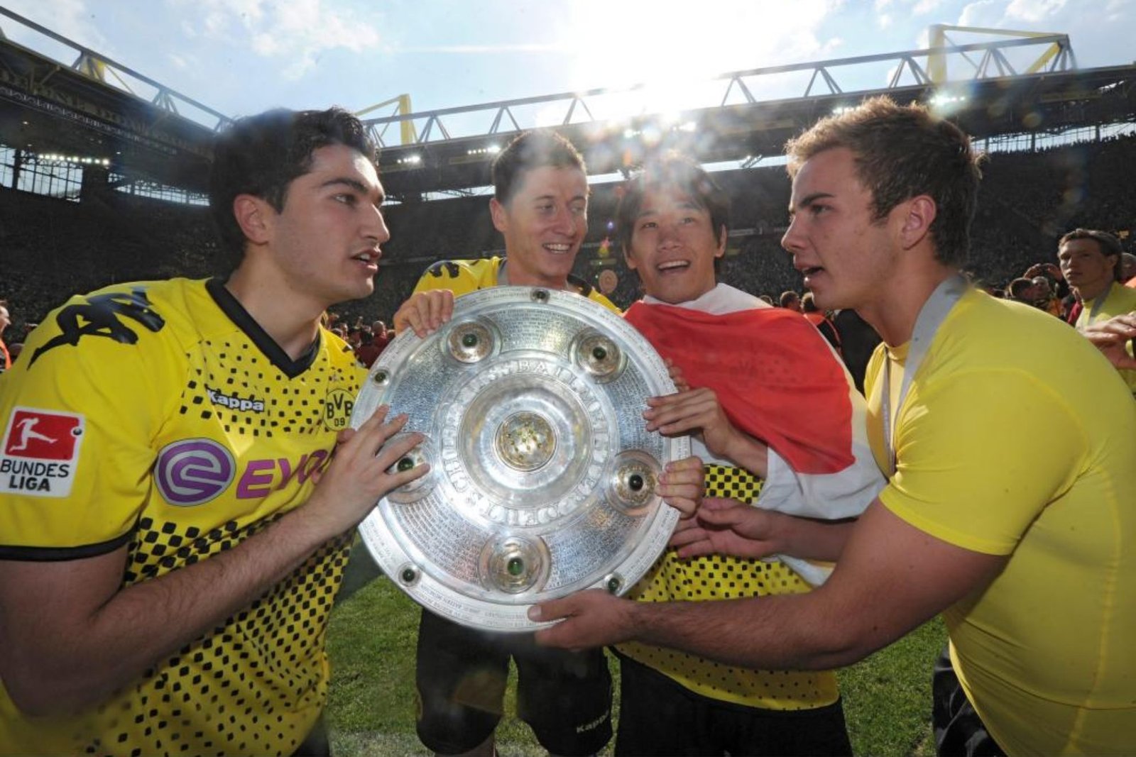 Götze, junto a Sahin, Kawaga y Lewandowski