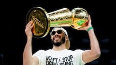 BOSTON, MASSACHUSETTS - JUNE 21: Jayson Tatum #0 of the Boston Celtics hoists the Larry O'Brien trophy as he is introduced during the Boston Celtics Victory Event following their 2024 NBA Finals win at TD Garden on June 21, 2024 in Boston, Massachusetts.   Maddie Malhotra/Getty Images/AFP (Photo by Maddie Malhotra / GETTY IMAGES NORTH AMERICA / Getty Images via AFP)