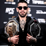Ilia Topuria, en UFC 308 con el cinturón de campeón y el BMF.